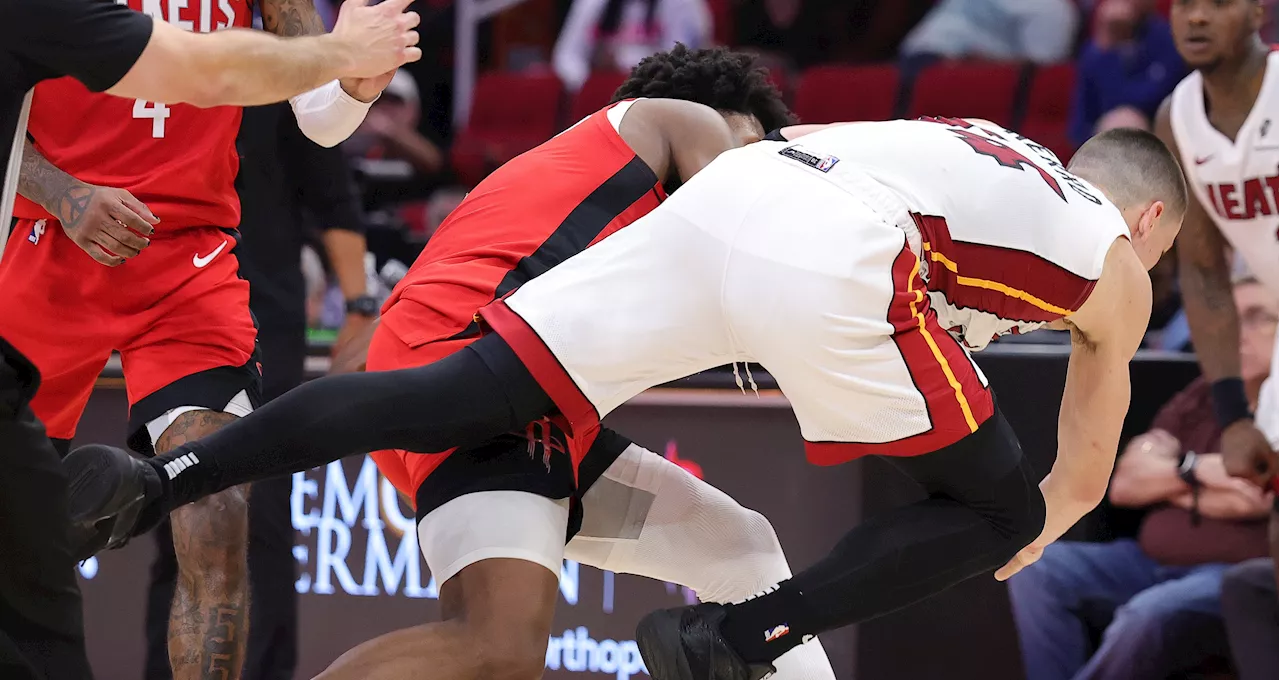 Tyler Herro thrown onto floor by Amen Thompson in Heat-Rockets