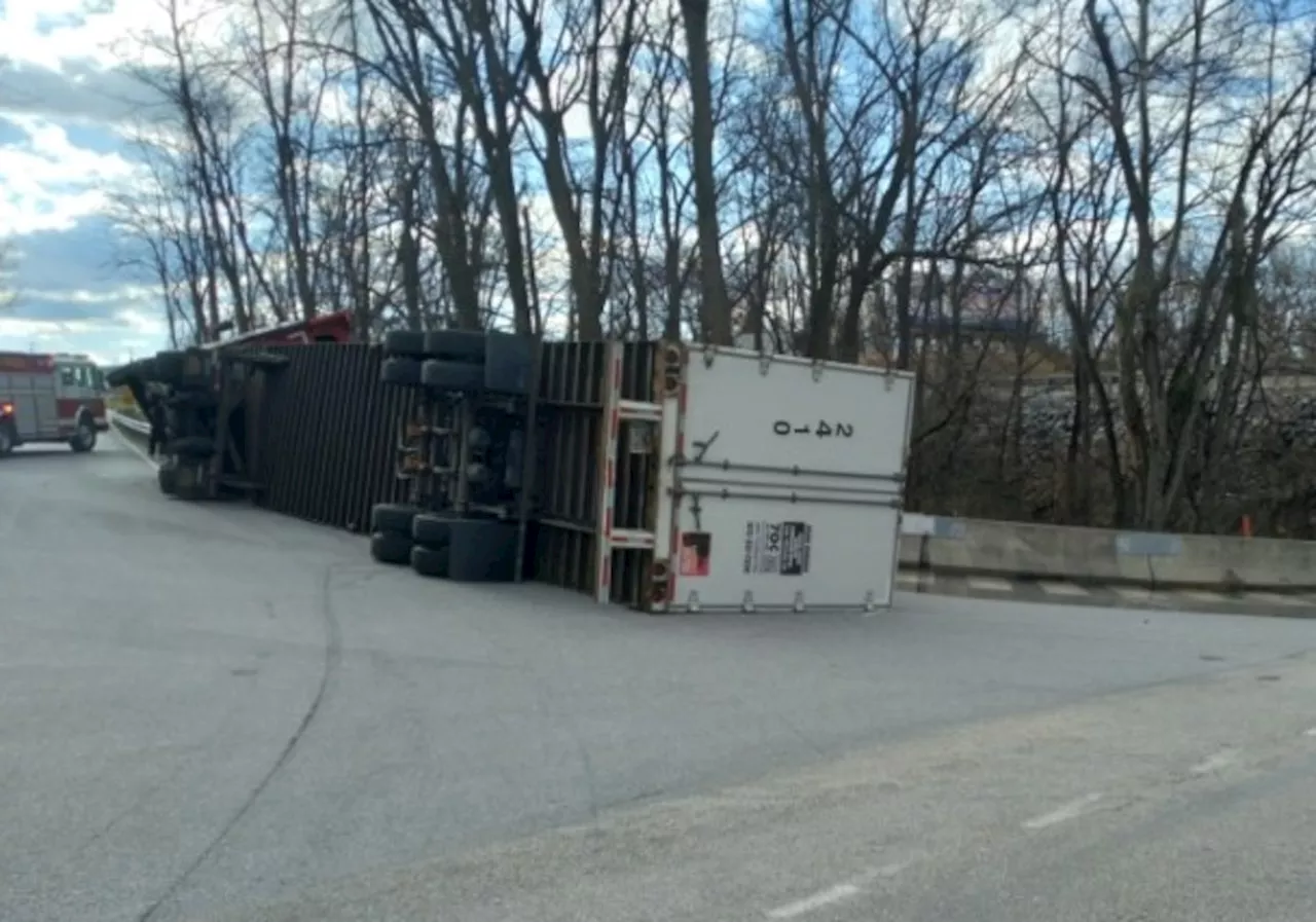 Tractor-trailer hauling corn syrup crashes, shuts down central Pa. intersection