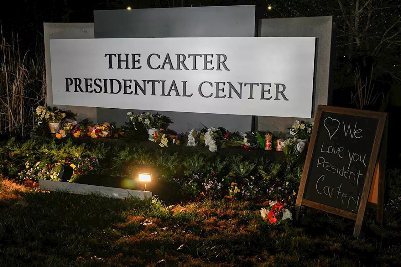 Tributes Pour In for Jimmy Carter: Peaches, Peanuts, and a Chalkboard Sign