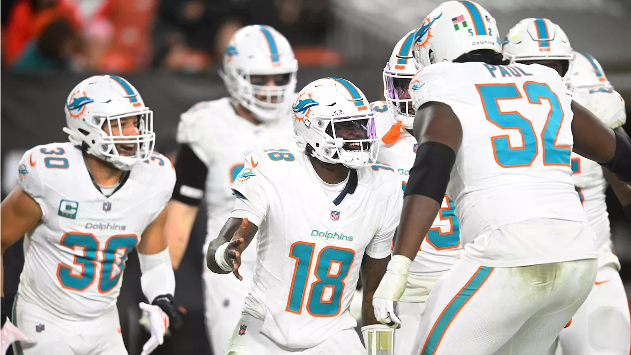 Huntley Leads Dolphins Past Browns in Playoff Race