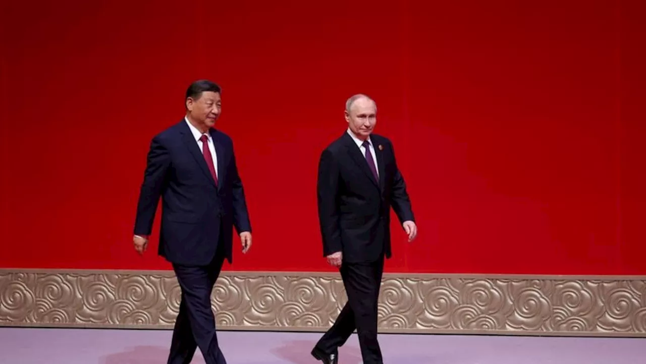 China, Russia always moving forward 'hand in hand', Xi tells Putin