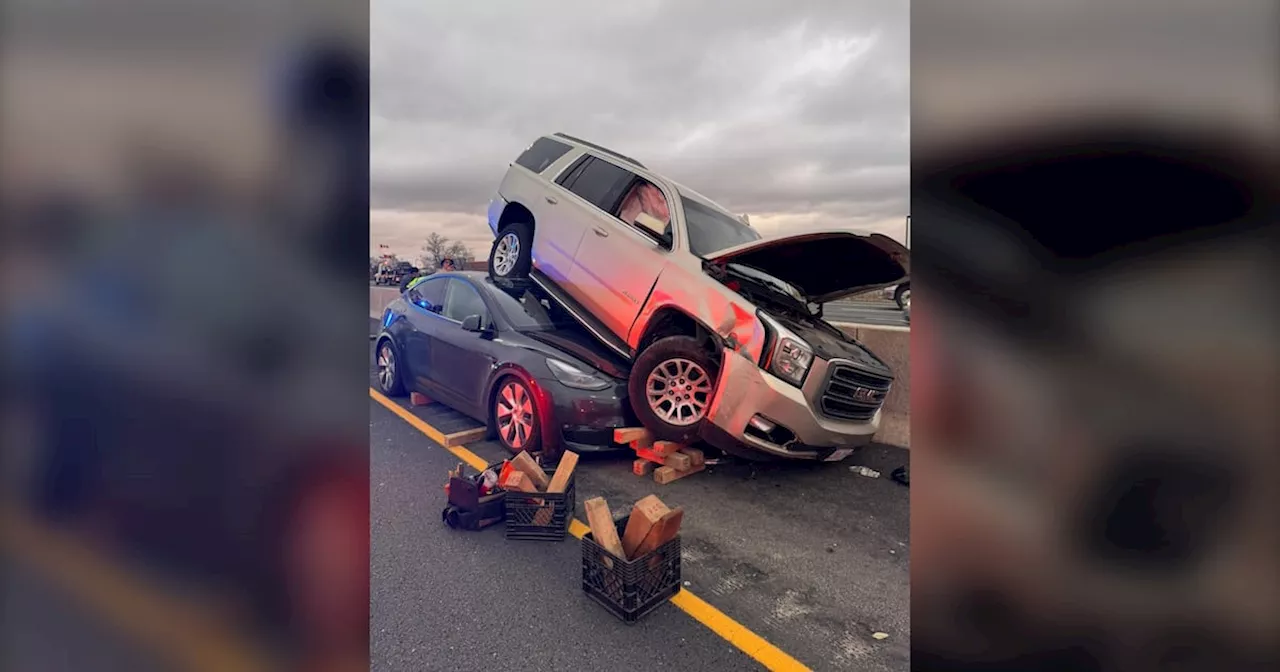 SUV Crashes Onto Tesla After Collision on Highway