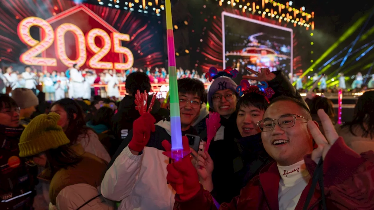 World Welcomes 2025 with Light Shows, Embraces, and Ice Plunges