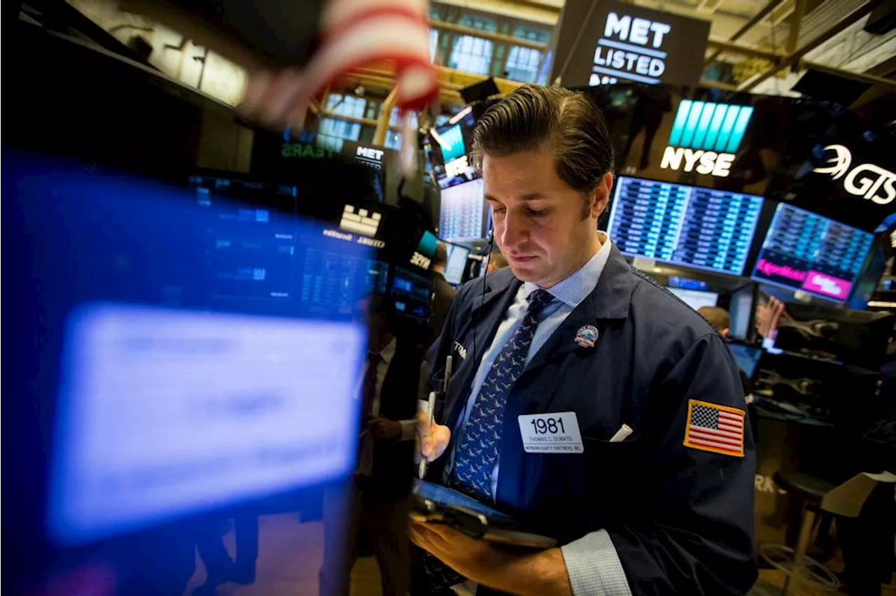 Wall Street Faller, Men Futures Indiiserer Positiv Start tirsdag