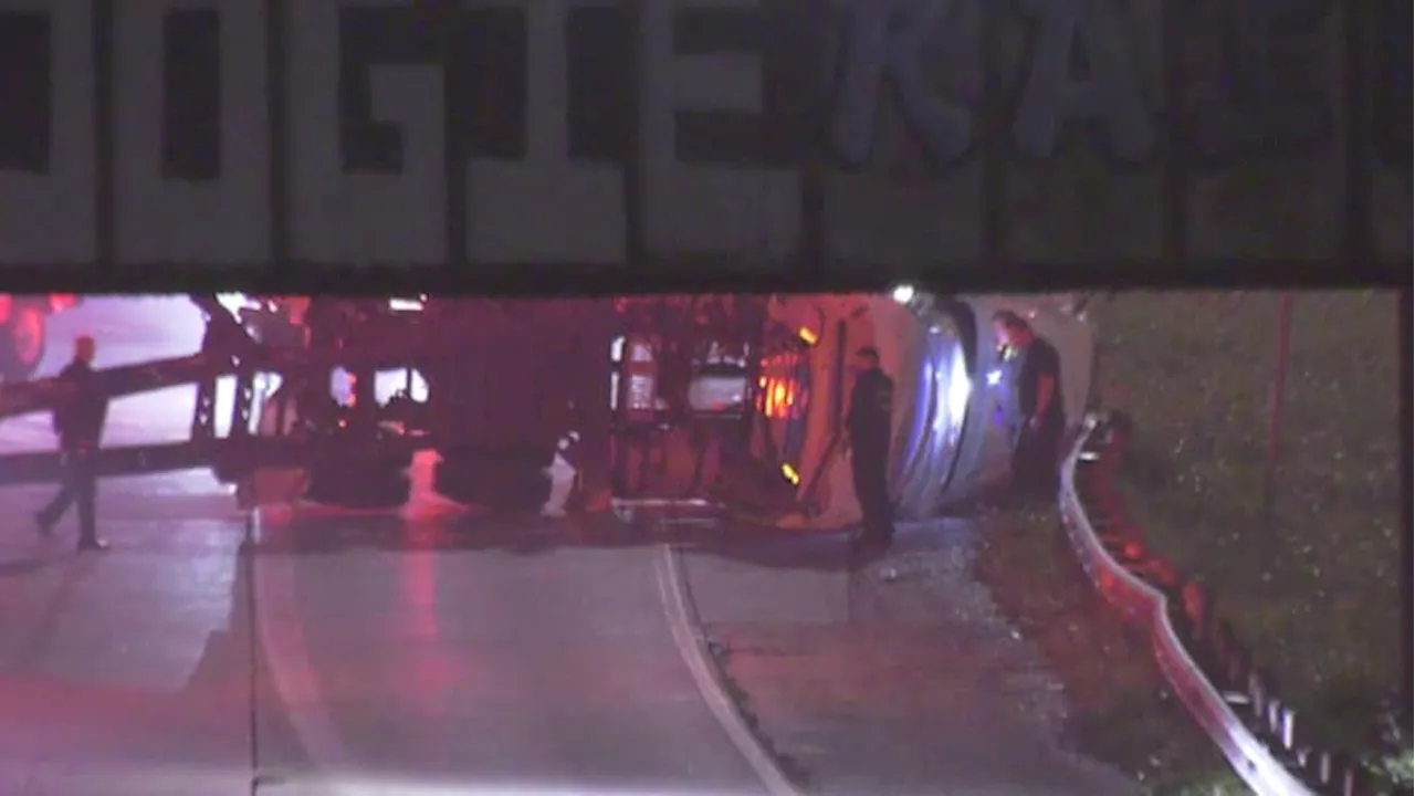 TRAFFIC ALERT: Heavy truck on its side blocking northbound lanes of I-45 N