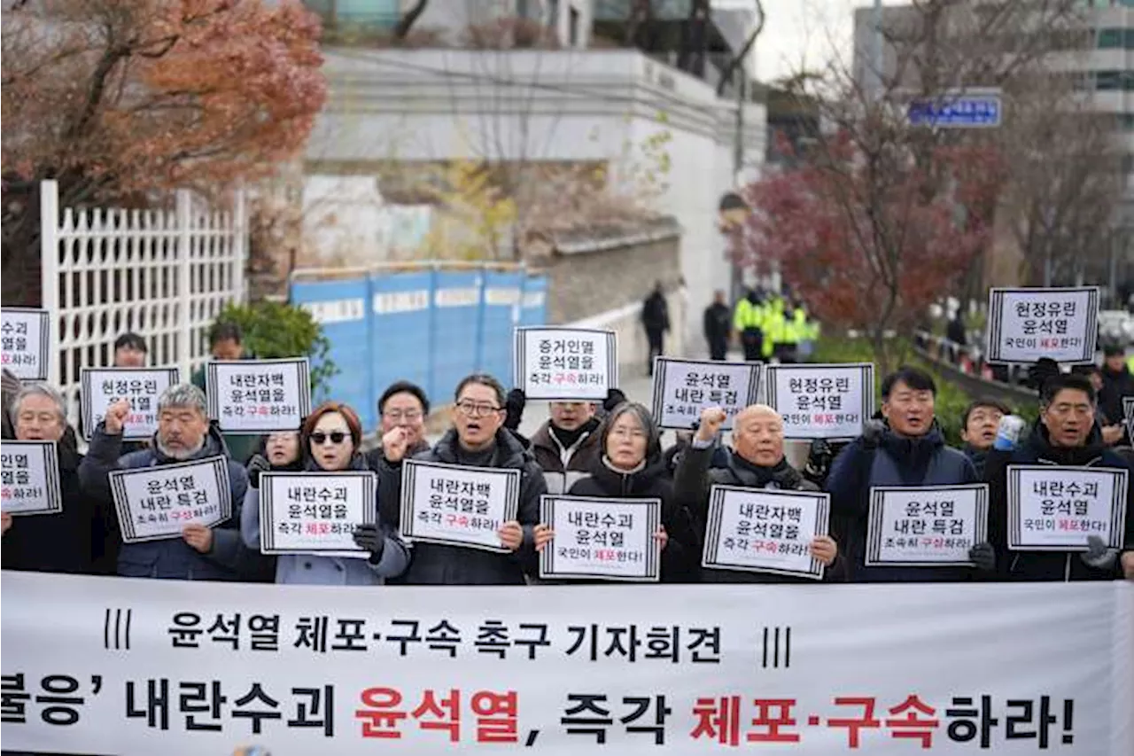 South Korean court issues warrants to detain impeached President Yoon and search his office