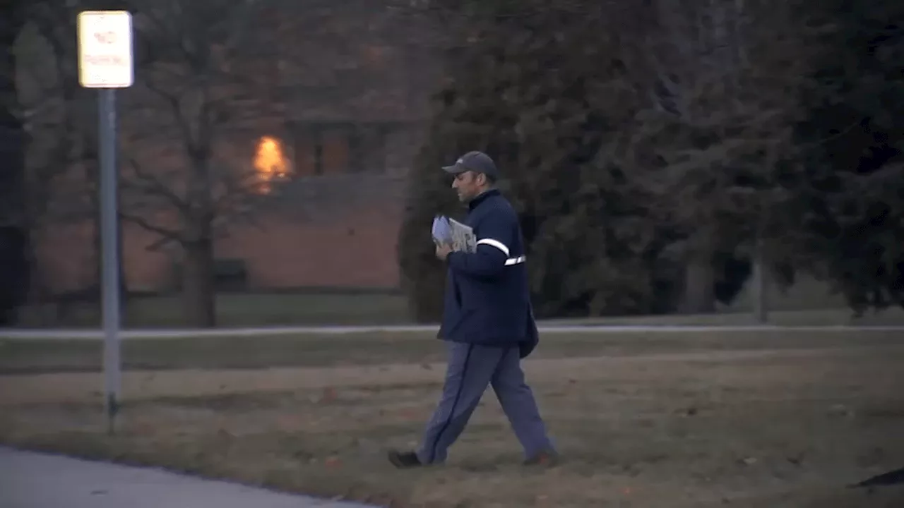 Letter Carrier Hailed Hero After Aiding Driver and Warning Residents During Garbage Truck Fire