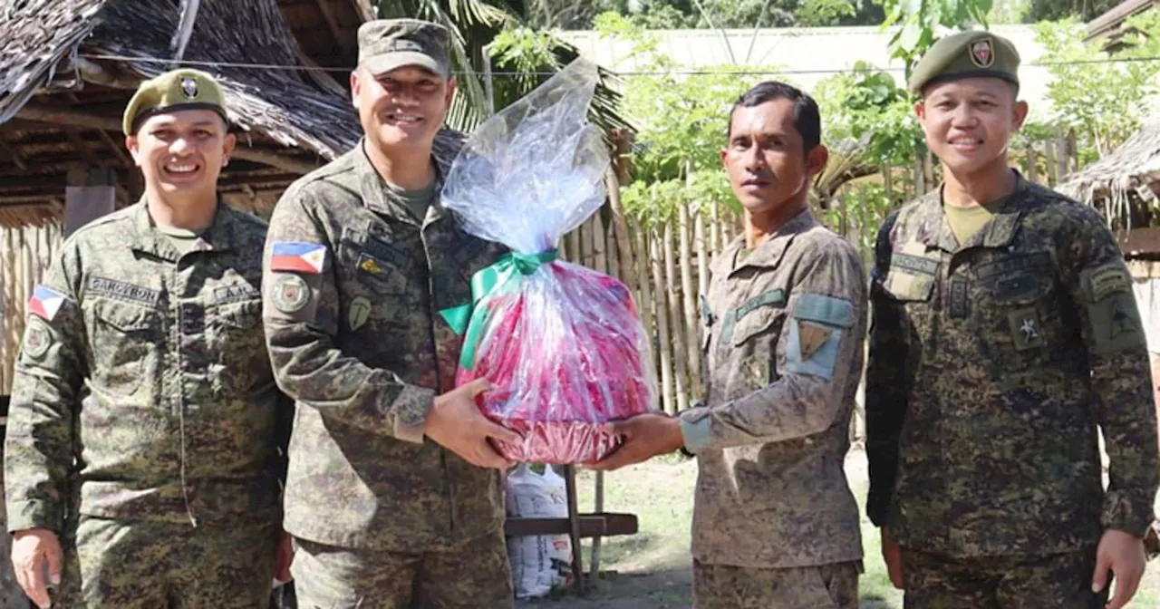 Army Distributes Food, Caps to Militiamen in Basilan Island Village