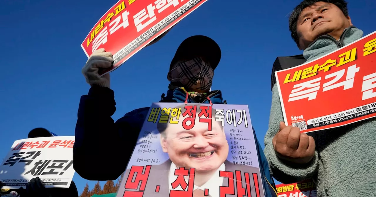 South Korea’s leader warned to resign or face impeachment over martial law decree