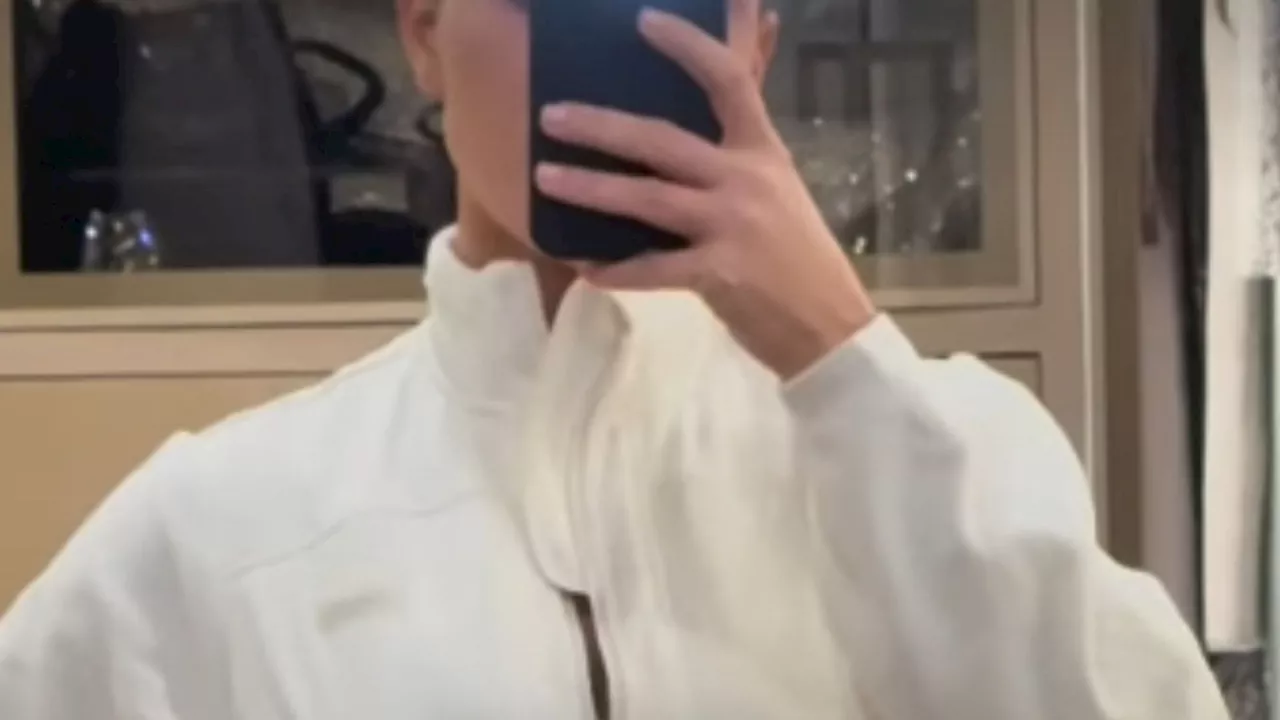 Kim Kardashian Rocks Skimpy Onesie in Mirror Selfie, Draws Comparisons to Bianca Censori