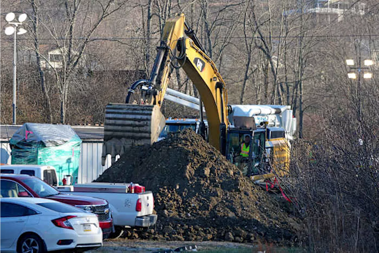 Rescuers reassess safety in search for a woman they believe fell into a Pennsylvania sinkhole