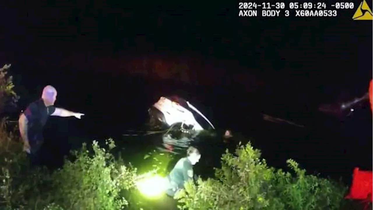 VIDEO: Bodycam footage shows St. Johns County deputy jumping into water to rescue women trapped inside car