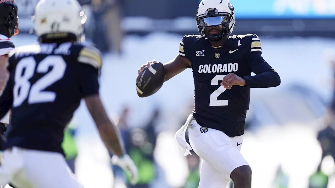 Two-way star Travis Hunter is Big 12's top defender, and Buffs QB Shedeur Sanders best on offense