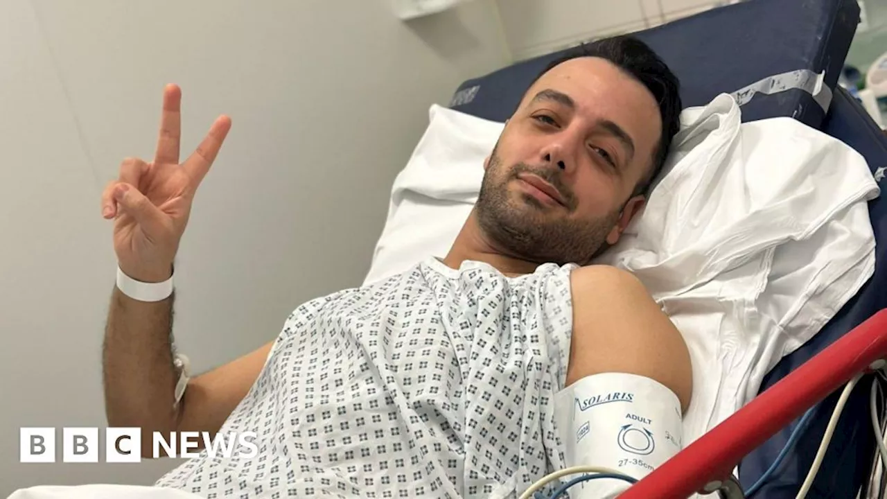 Two men charged over stabbing of Iranian journalist in UK