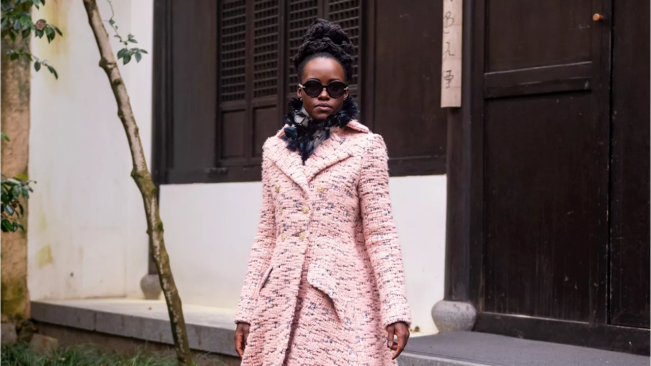 Lupita Nyong’o Bundled Up In Couture For Chanel’s Hangzhou Show