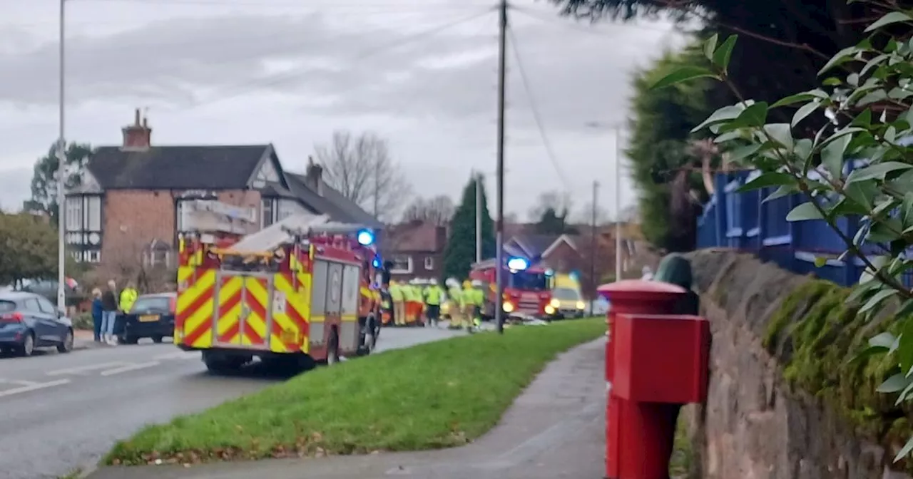 Woman taken to hospital after crash with parked car