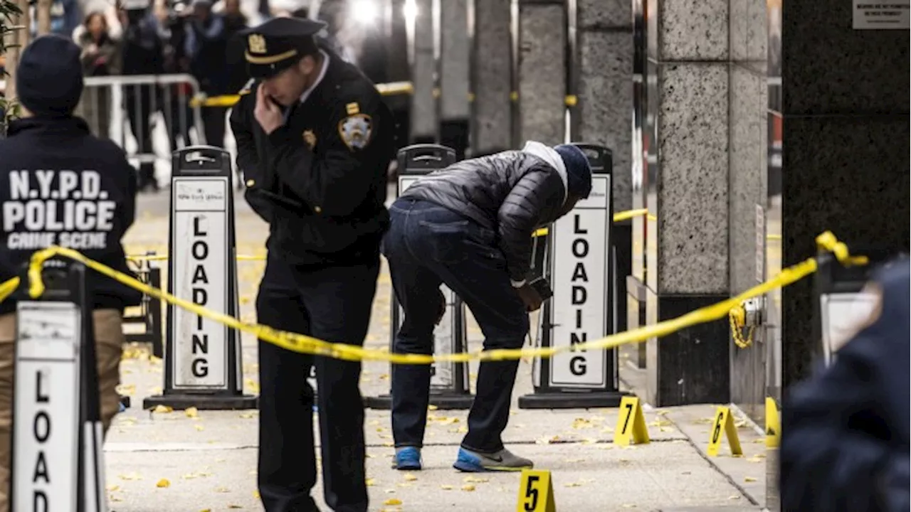 New York police investigate bullet casing inscriptions in killing of insurance executive