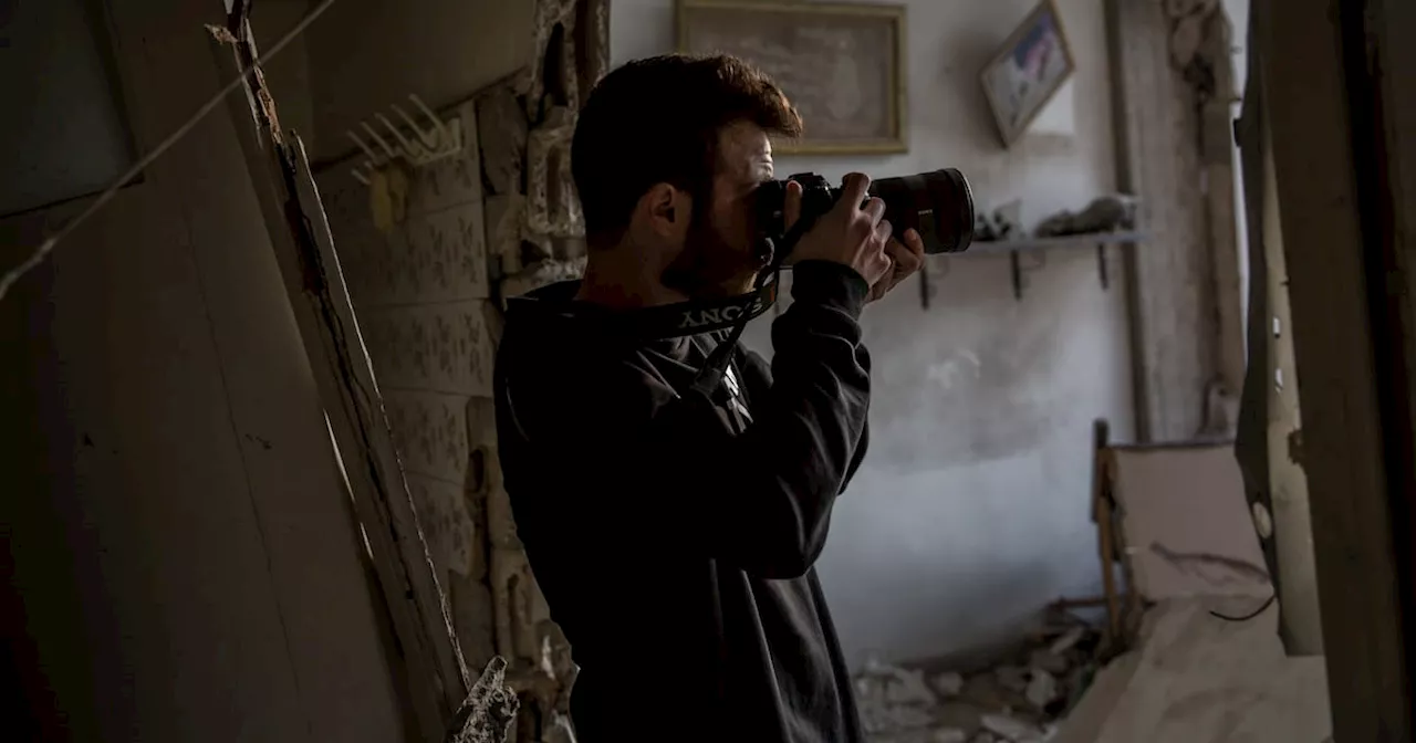 Lebanese Photographer Shifts Focus from Nightlife to War Coverage