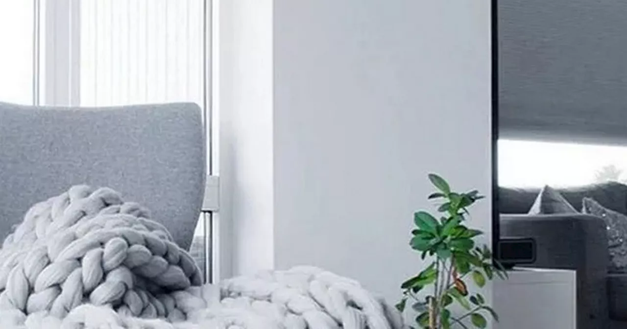 Debenhams reduces £100 chunky knit throw to £23 that's 'very soft and warm'