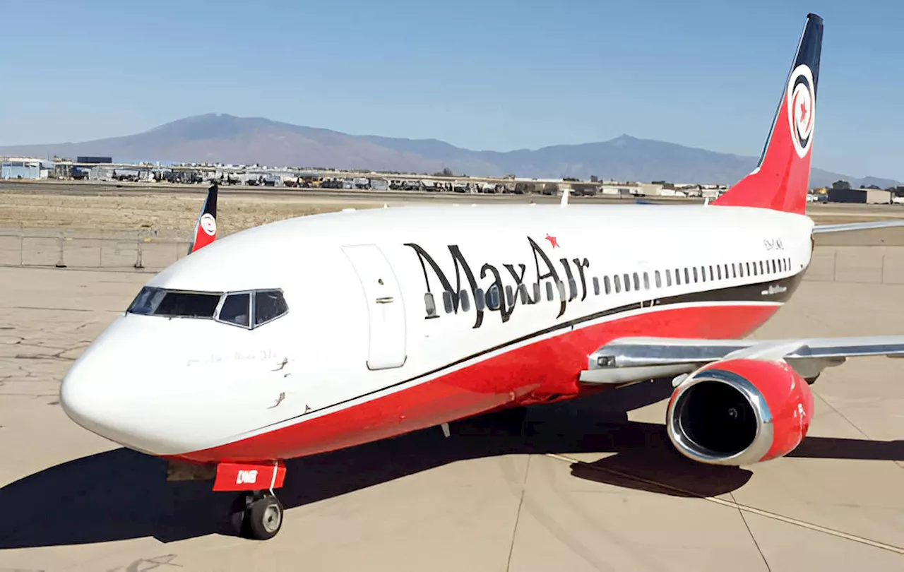 Max air airplane makes emergency landing as engine catches fire