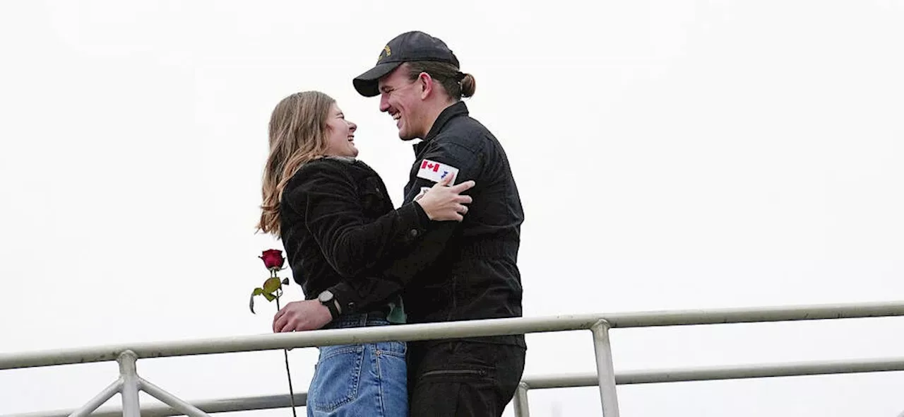 First Class Sailor Wins First Kiss After Six-Month Deployment