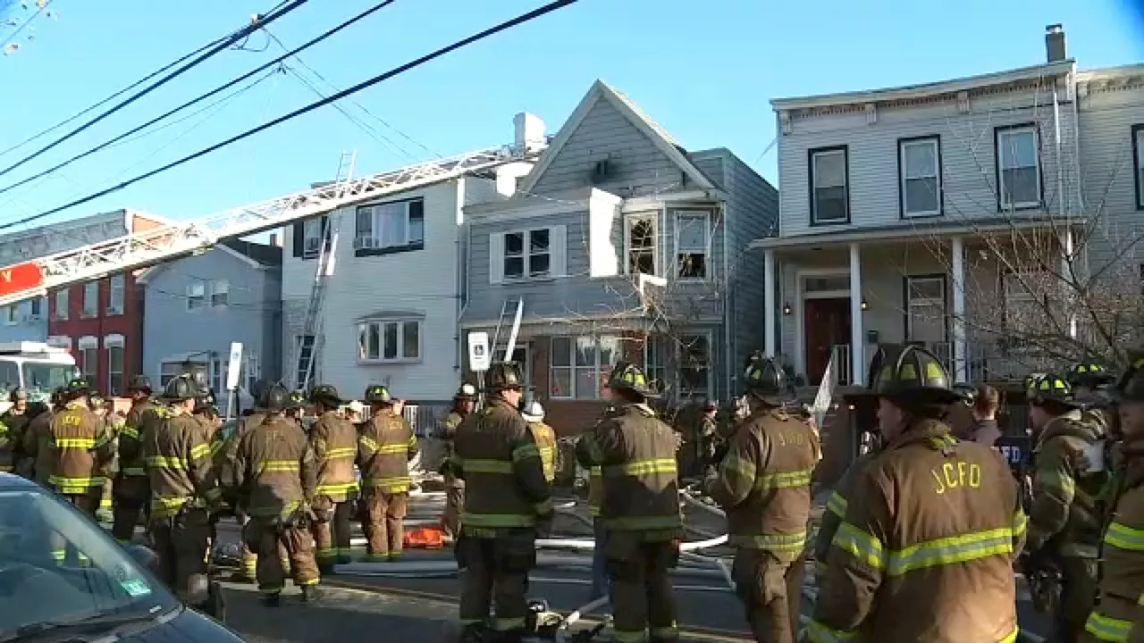 Firefighters rescue baby trapped inside burning home in Jersey City; teen also hospitalized