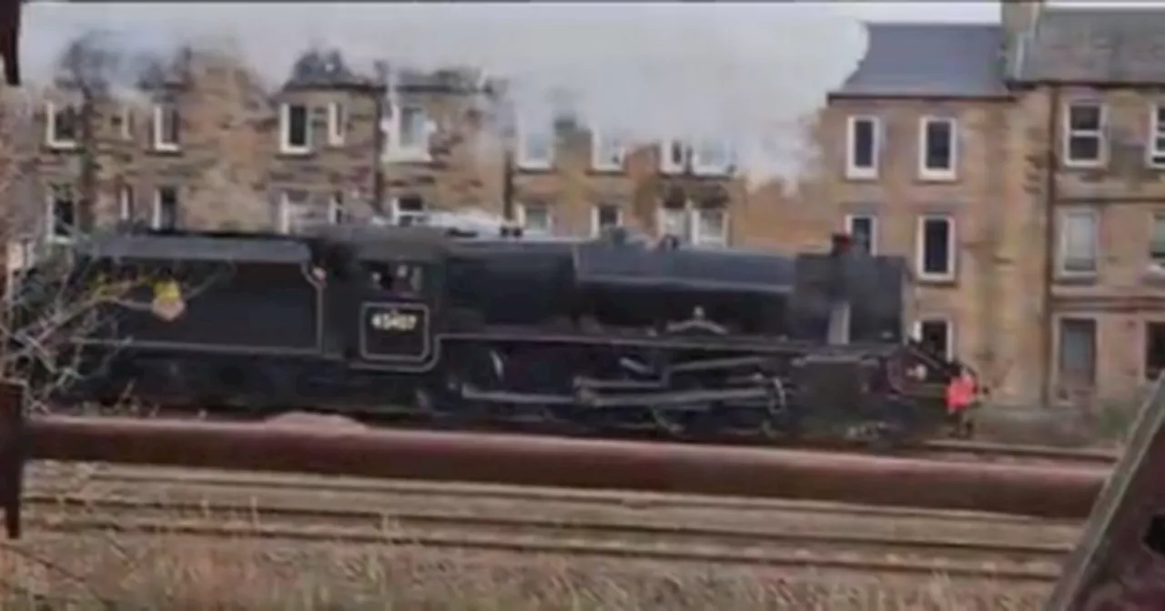 Awestruck Scots watch as The Polar Express steams past their homes