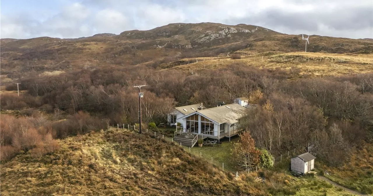 Inside spectacular Isle of Skye lodge for sale with loch and mountain views