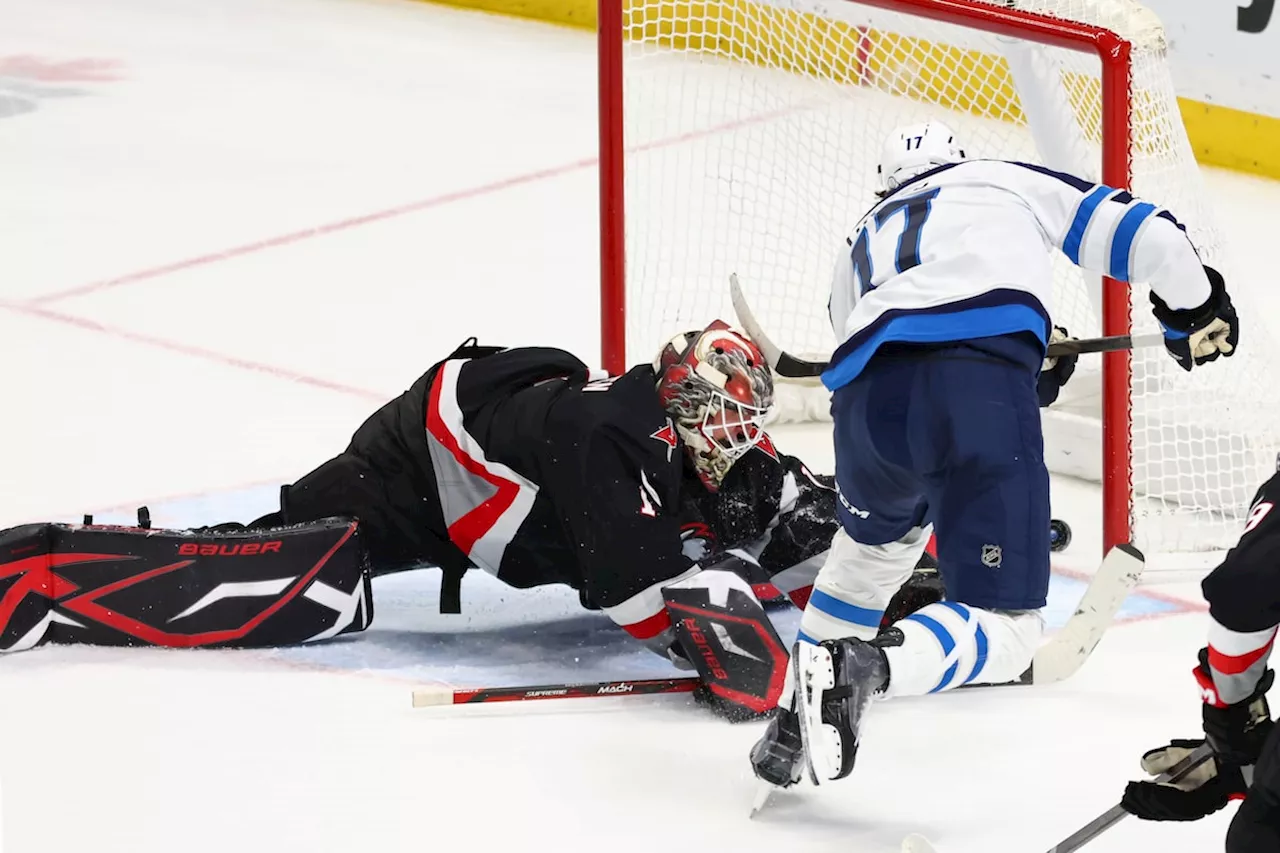 Lowry scores in OT to give Jets 3-2 win over Sabres and end four-game skid