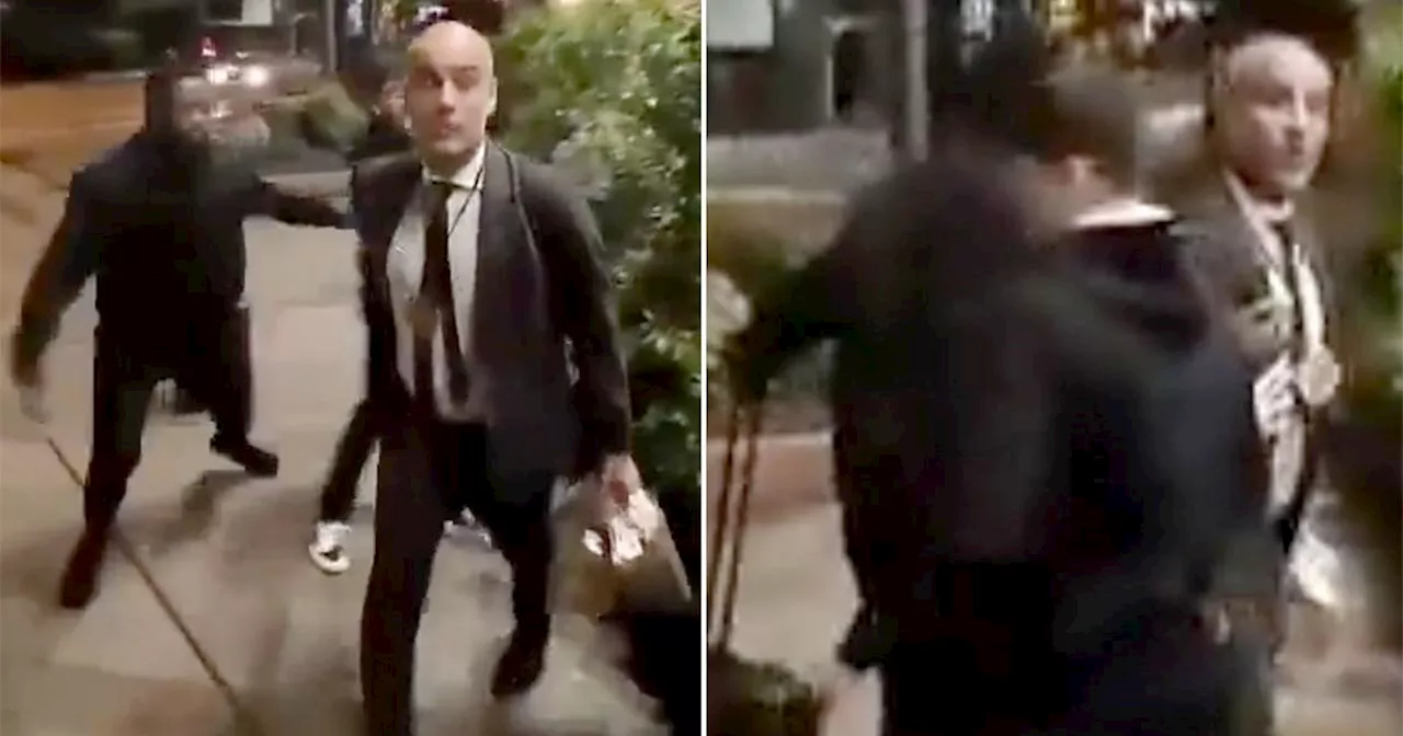 Guardiola confronts fan in street as angry Man City manager has to be held back