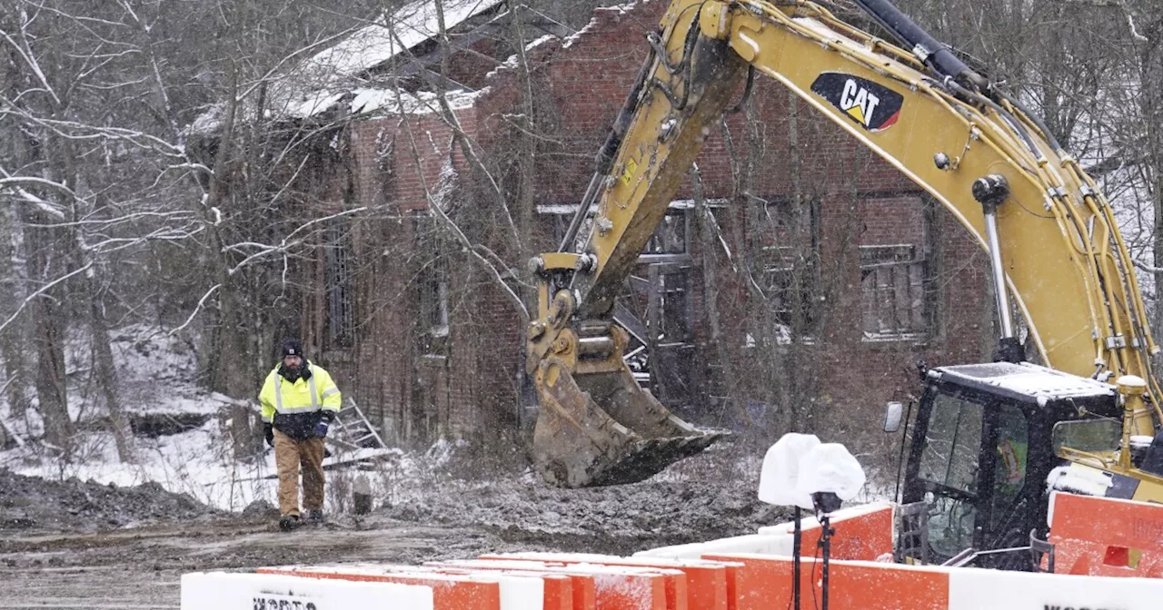 A body has been found in the search for a woman missing near a Pennsylvania sinkhole