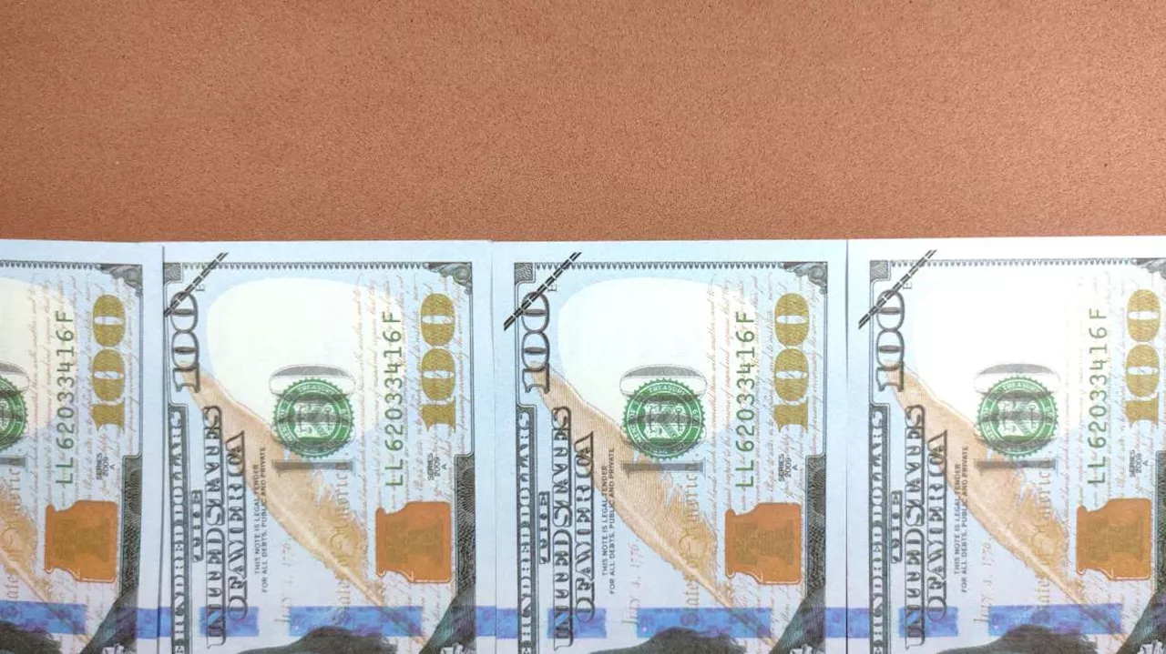 Salem woman accused of paying bill with fake money faces real charges