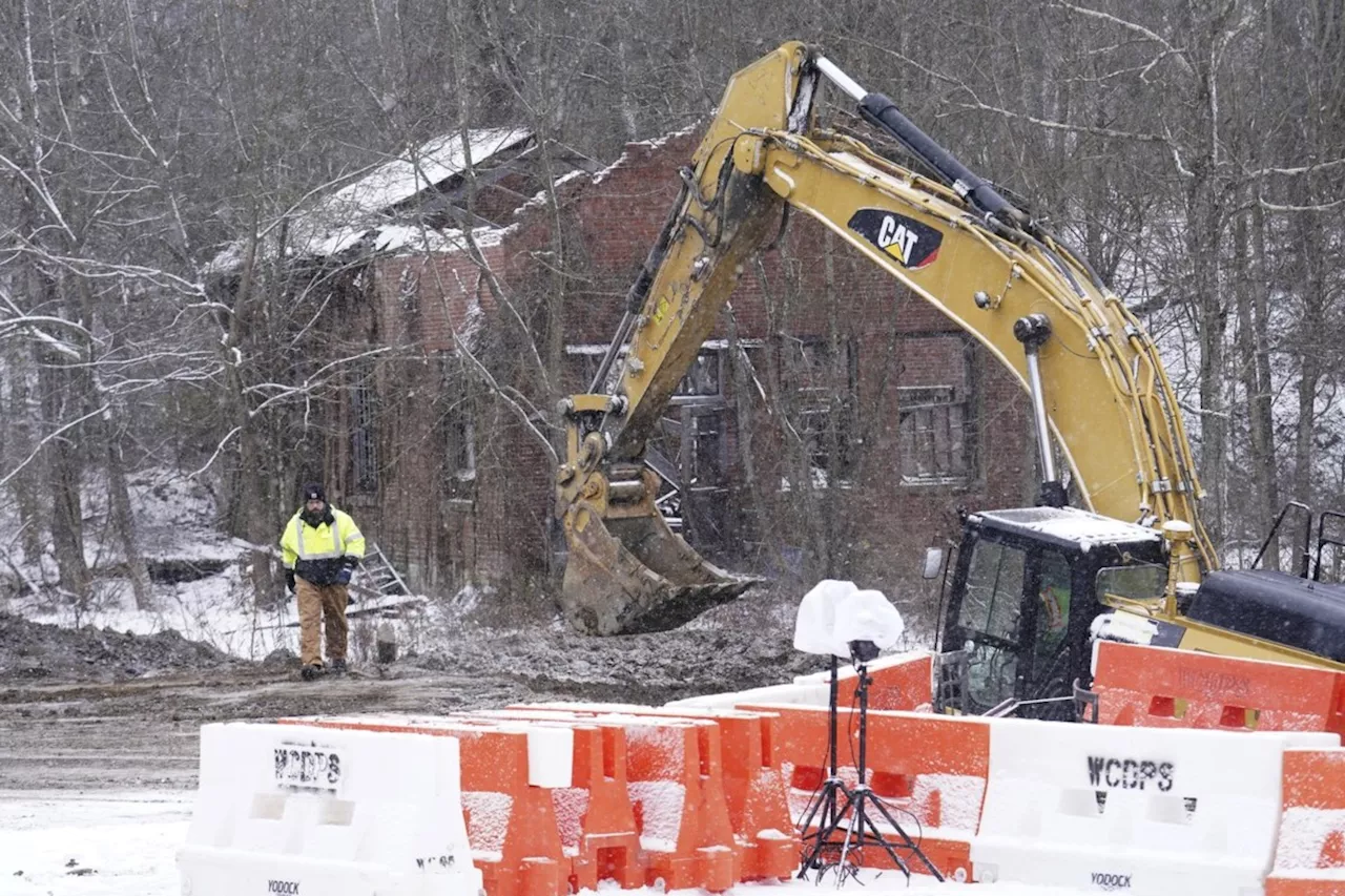 Crews recover the body of a woman from a Pennsylvania sinkhole