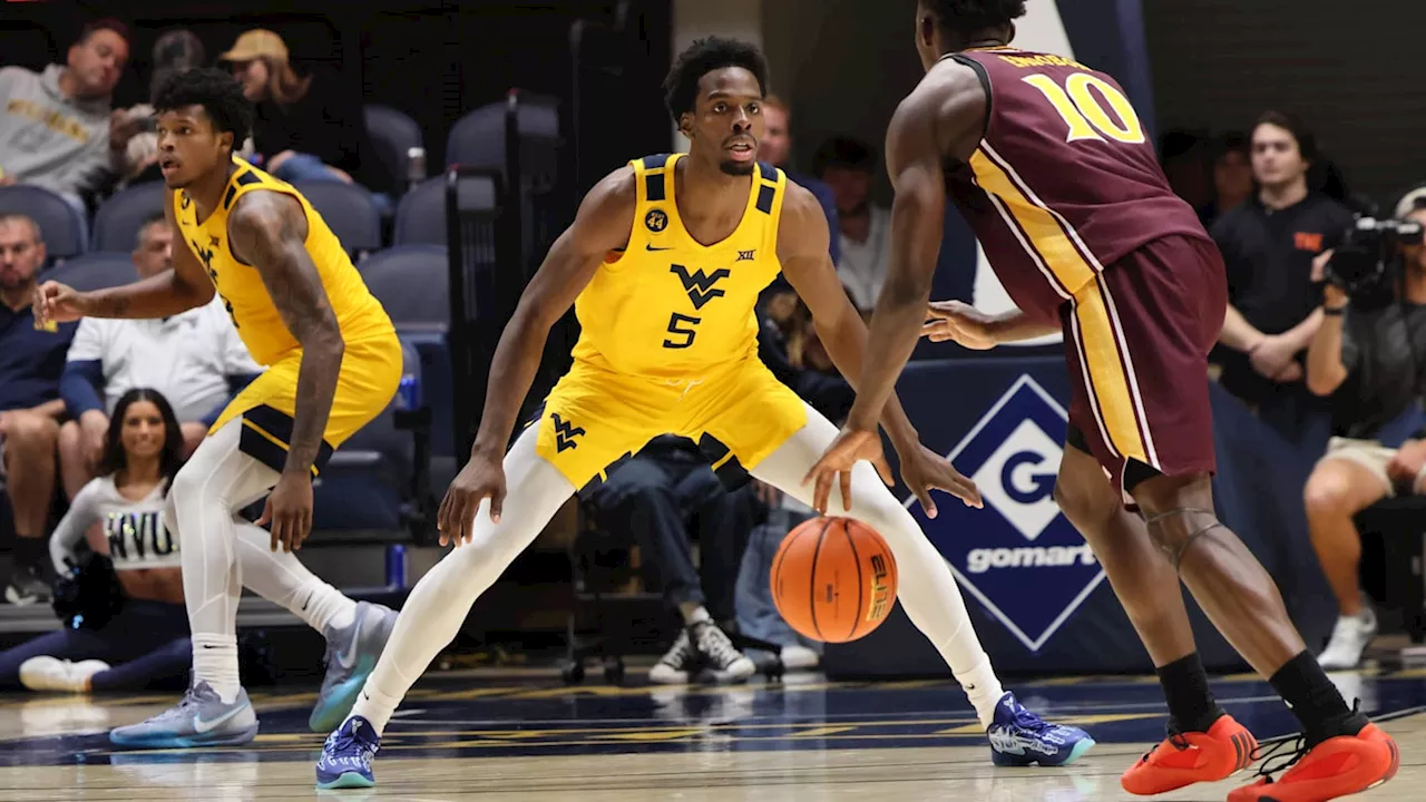 West Virginia Clashes with Georgetown in the Big 12-Big East Battle