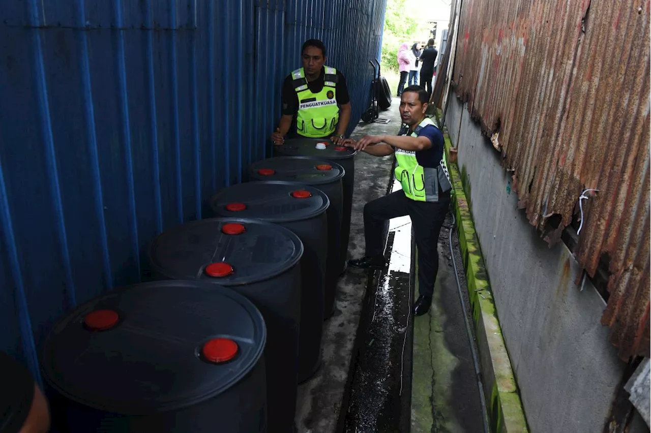 Over RM1mil worth of fake liquor seized in Penang warehouse raid