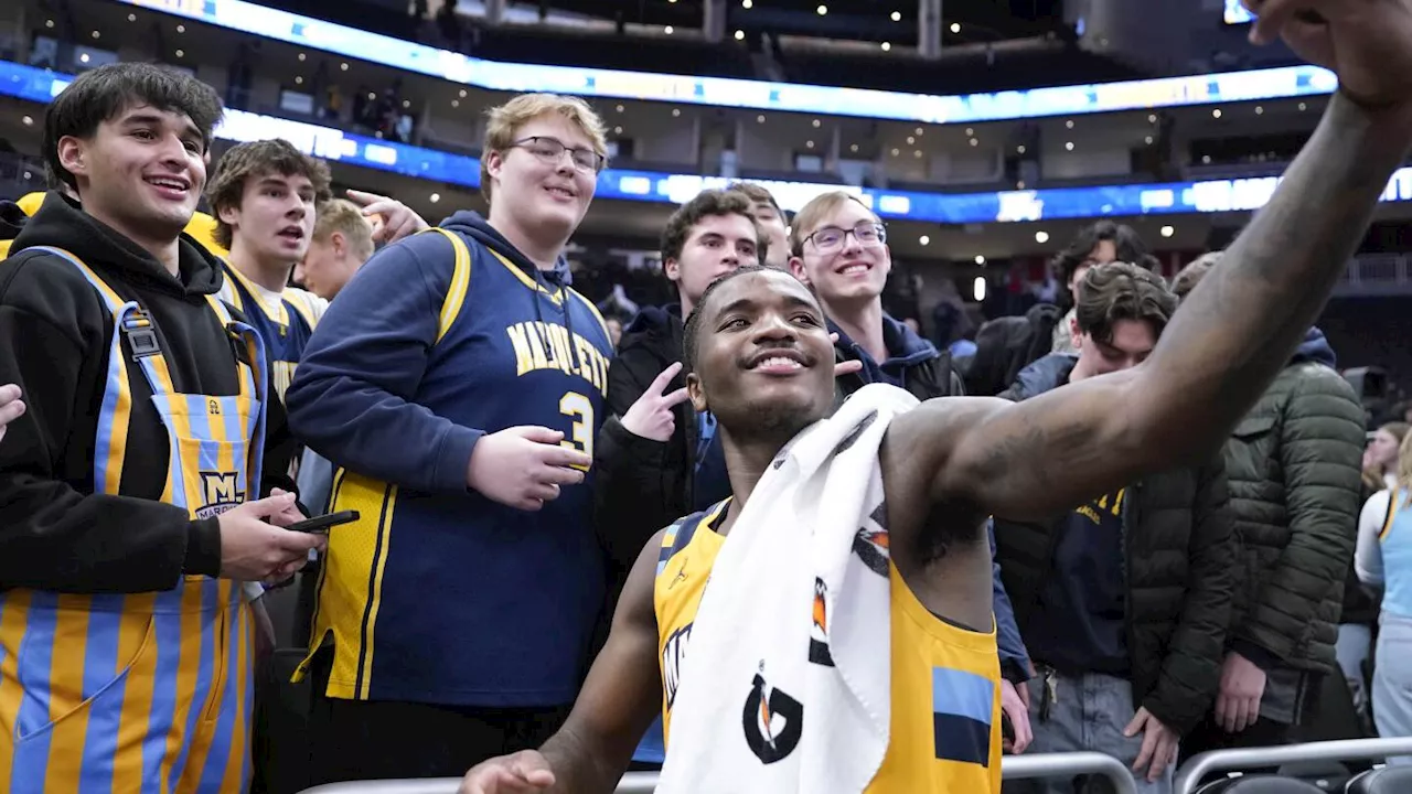 Jones scores 32 points to lead No. 5 Marquette past No. 11 Wisconsin, 88-74