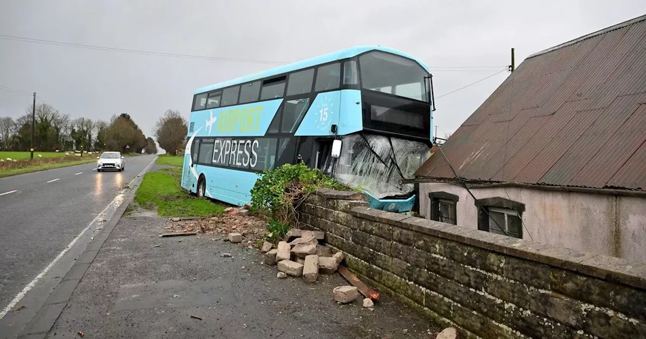 Belfast Airport bus crashes as Storm Darragh batters region