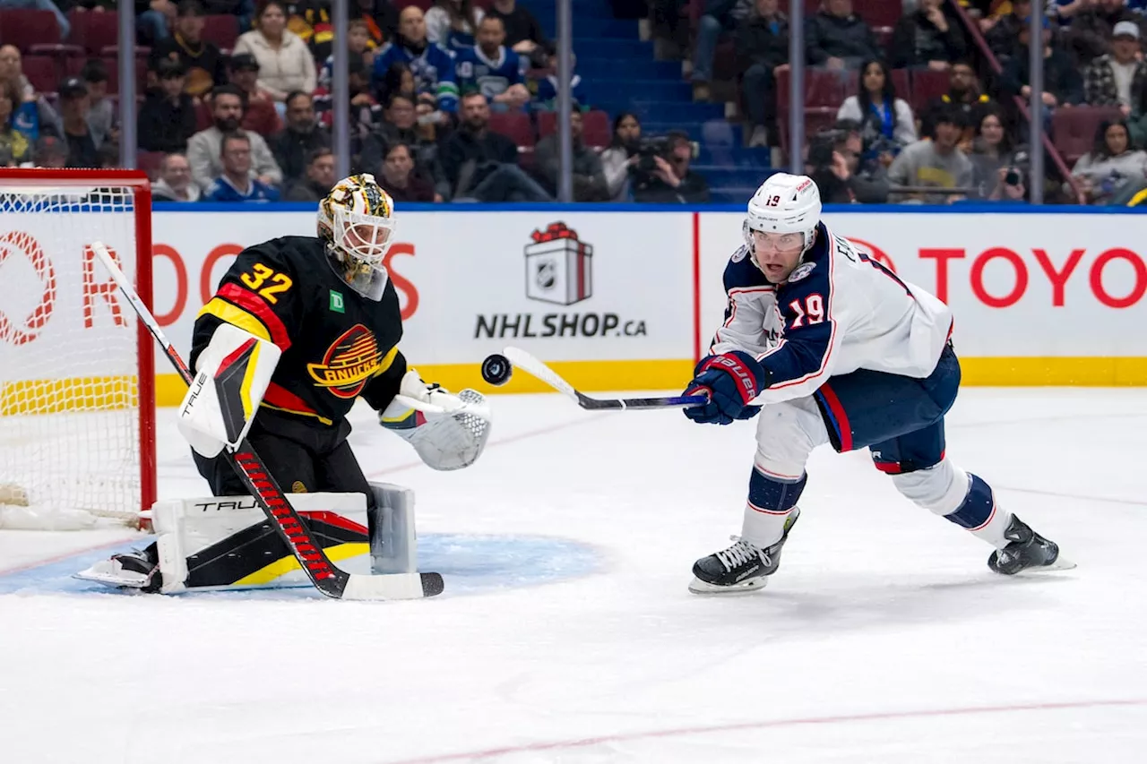 Suter scores twice as Canucks down Blue Jackets 5-2