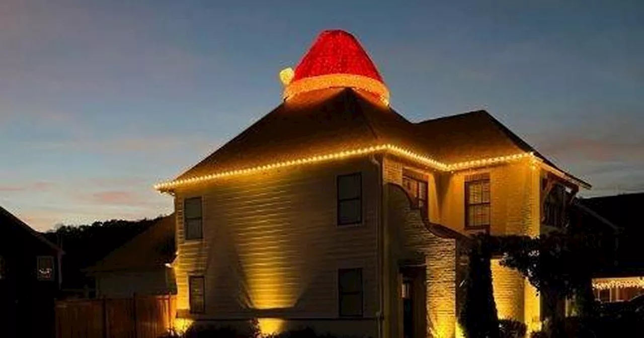 'King of Christmas' covers roof with giant Santa Claus hat