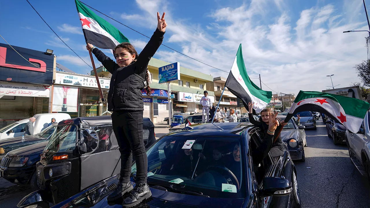 Jubilation and gunfire as Syrians celebrate the end of the Assad family's half-century rule