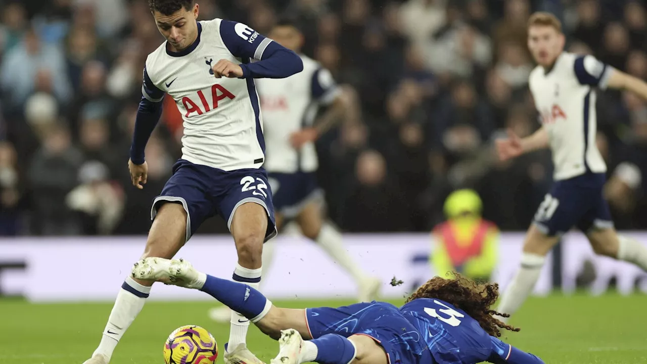 Chelsea defender Cucurella changes cleats in disgust after slipping twice to concede goals