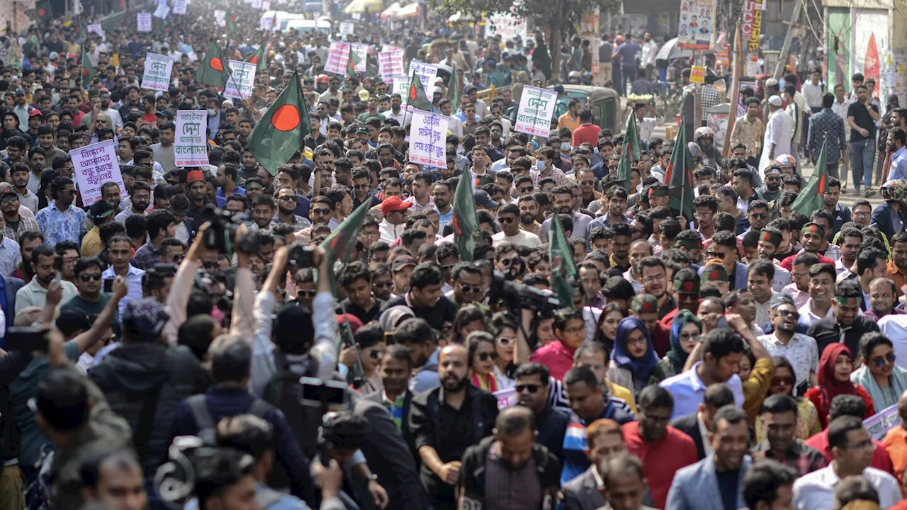 Supporters of Bangladesh Nationalist Party march in protest at attacks in India