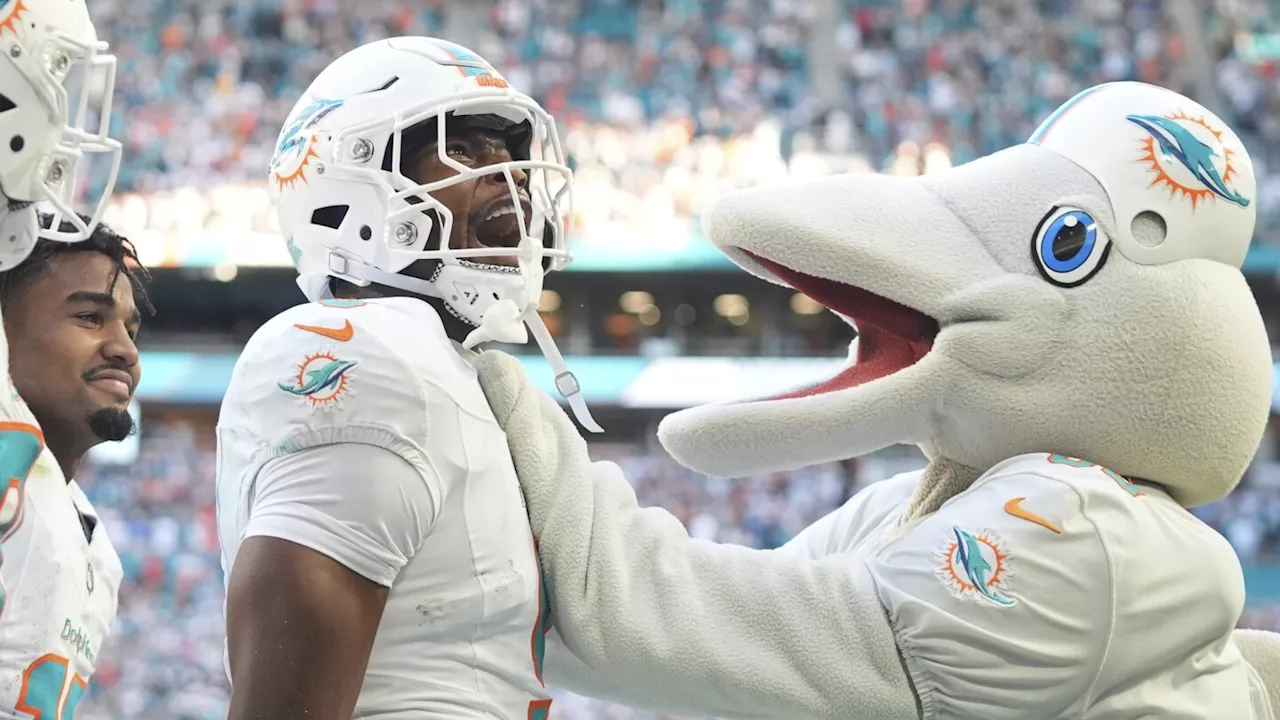 Tua Tagovailoa's TD pass to Jonnu Smith gives Dolphins 32-26 overtime win over Aaron Rodgers, Jets