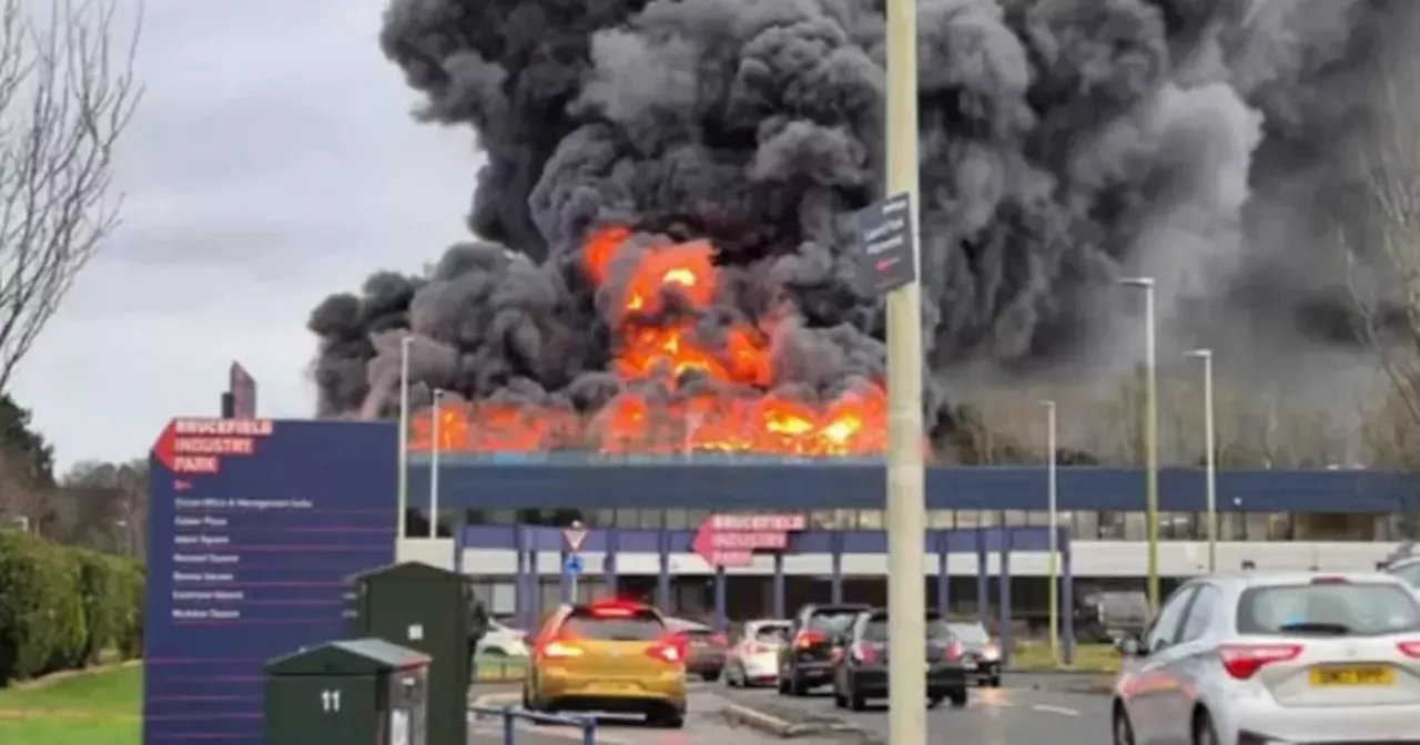 Fire crews remain at Scots industrial estate after inferno engulfs factory