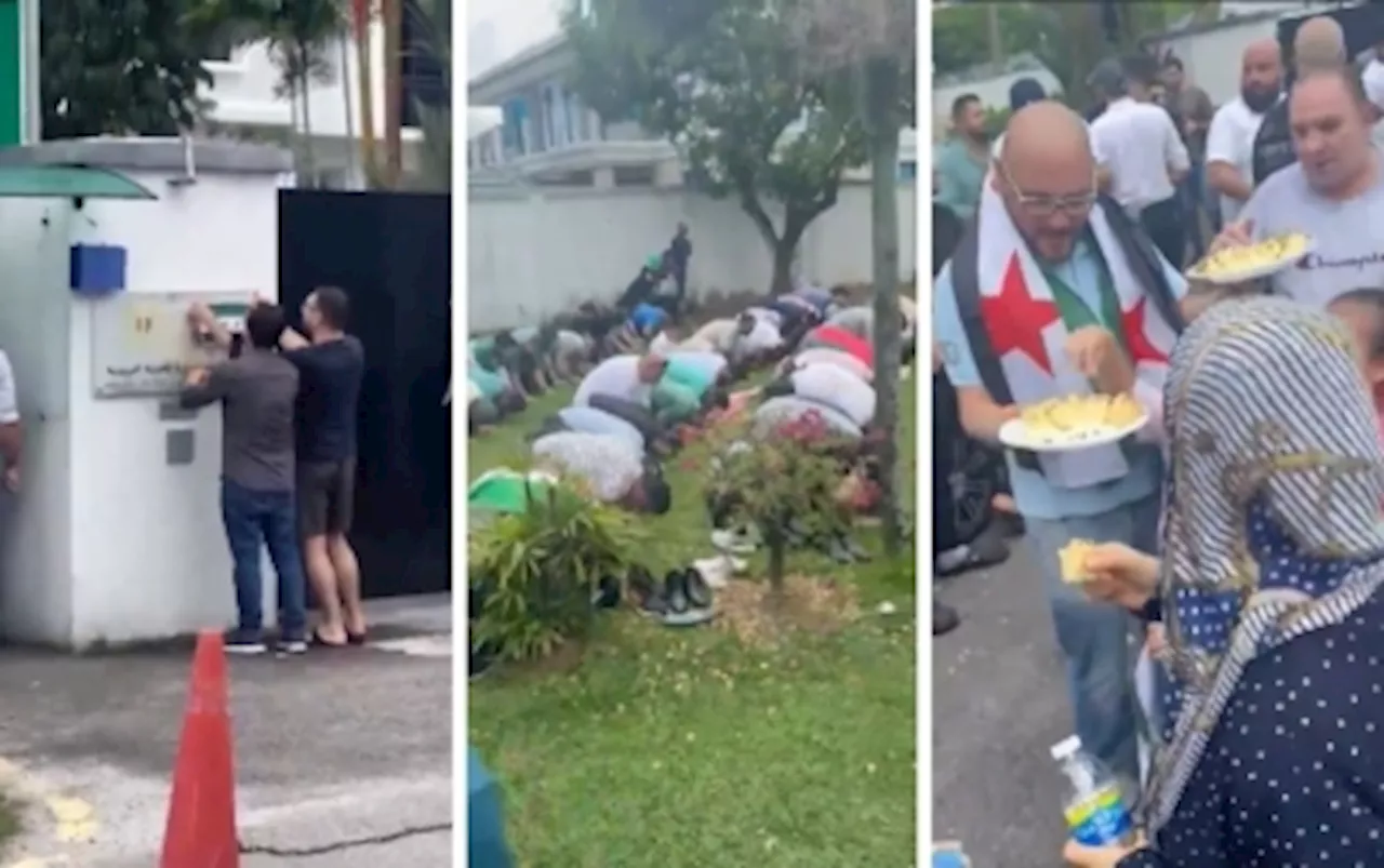 Syrians in Malaysia celebrate end of Assad regime by changing to rebel flag at embassy, sharing food and prayers (VIDEO)