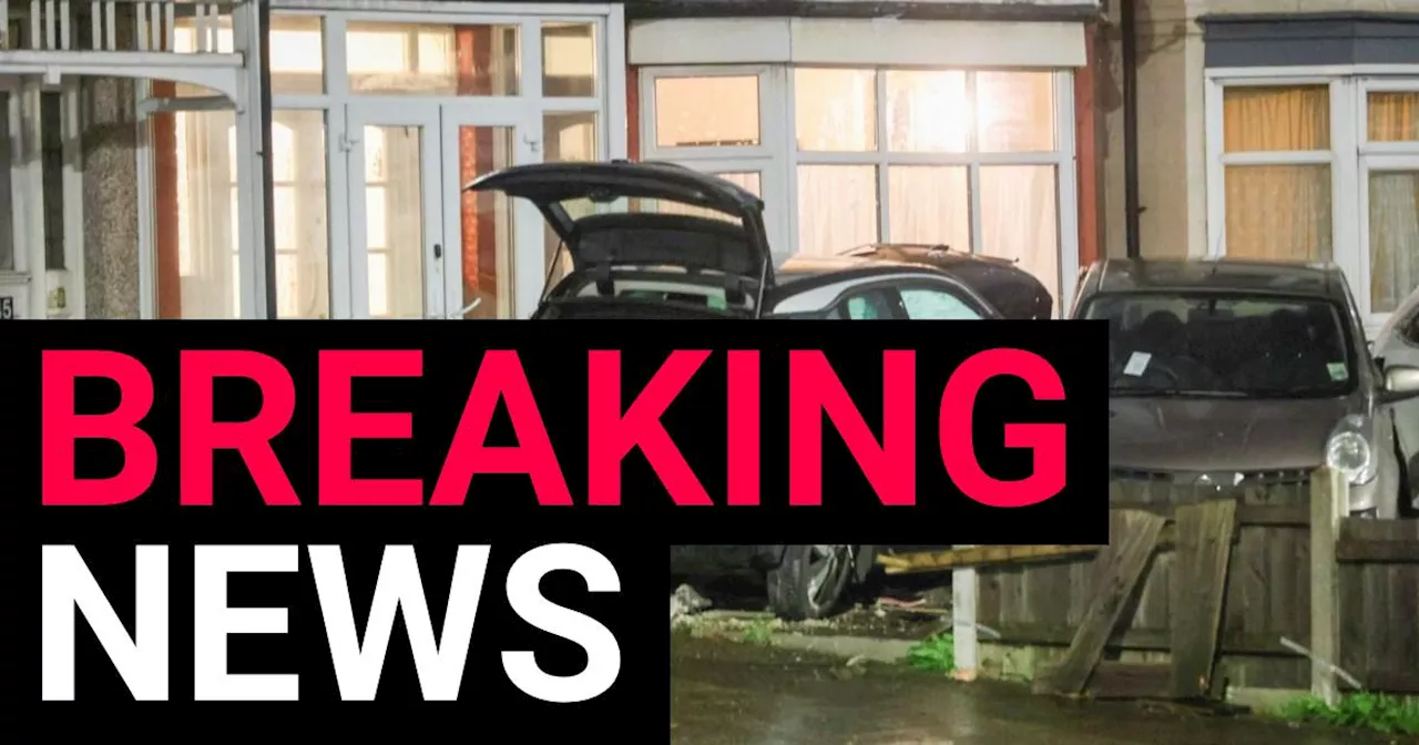 Woman in her 60s killed after car crashes into house