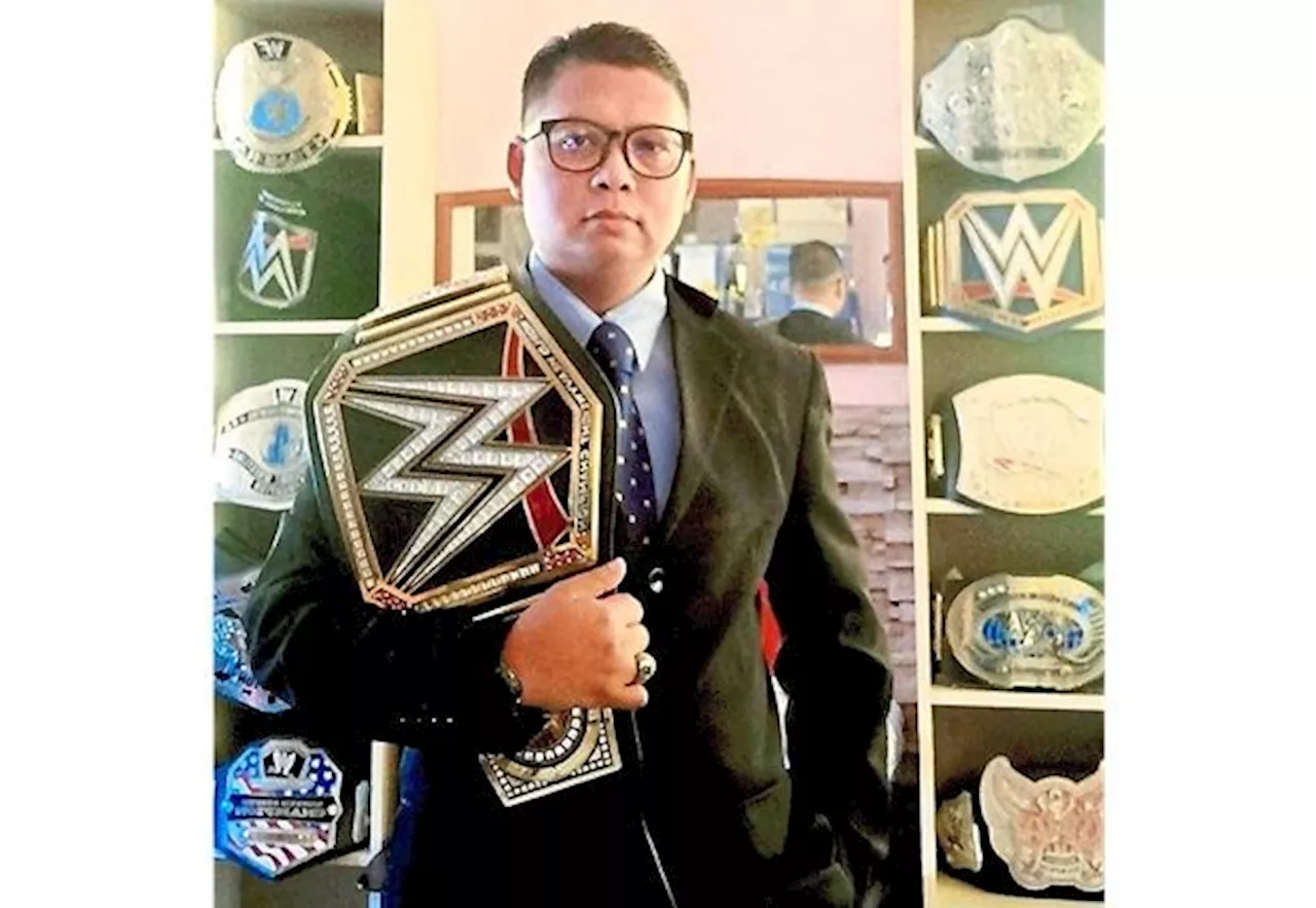 Wrestling fan has many trophies under his belt