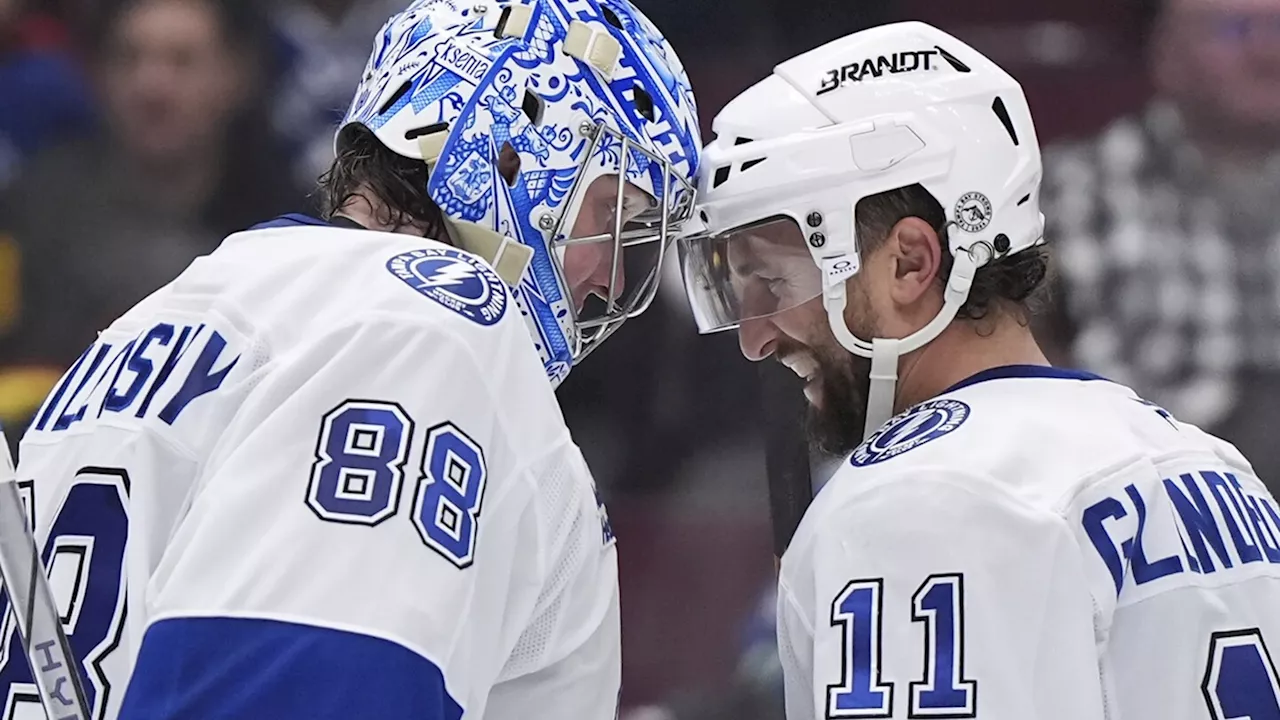 Brayden Point's 4-point night leads the Lightning over the Canucks 4-2