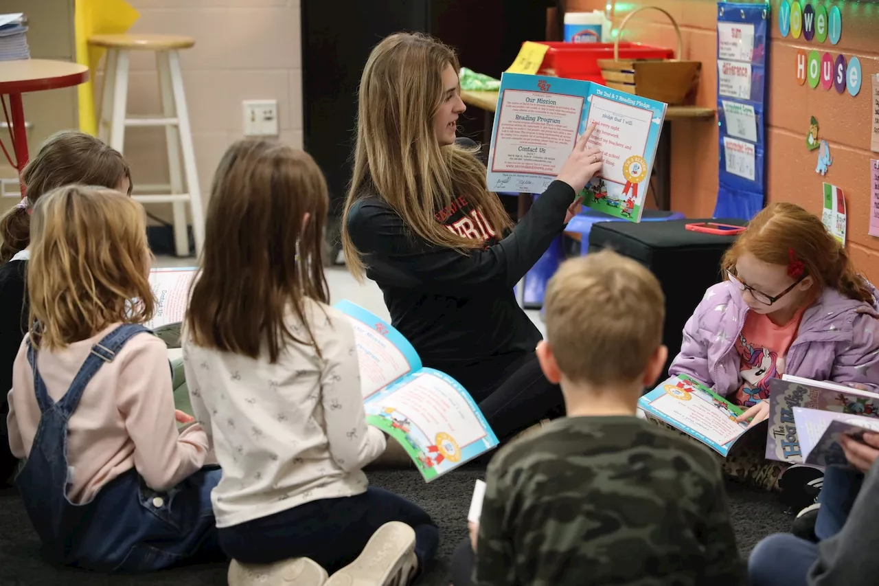 Fairview Park student-athletes promote literacy at Gilles-Sweet Elementary: A Place in the Sun