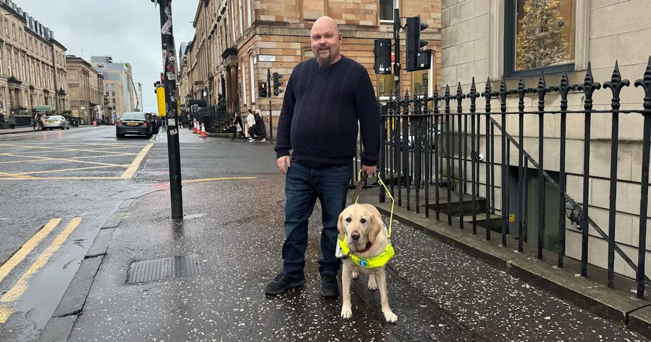 Blind Glasgow charity boss threatened by cyclist after nearly running over guide dogs